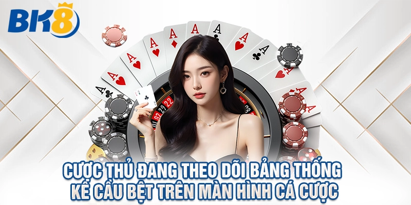 Cược thủ đang theo dõi bảng thống kê cầu bệt trên màn hình cá cược