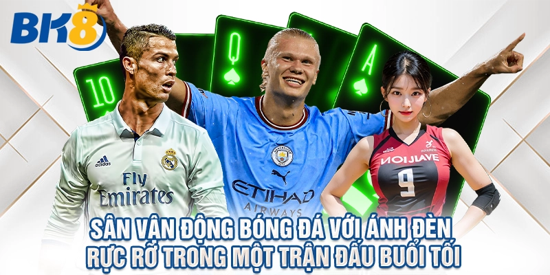 Sân vận động bóng đá với ánh đèn rực rỡ trong một trận đấu buổi tối